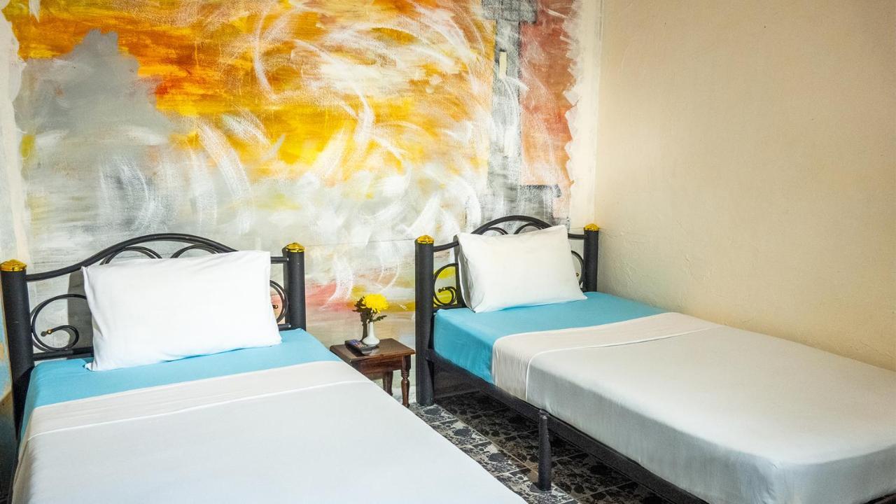 Sabina Guesthouse Kamala Bagian luar foto